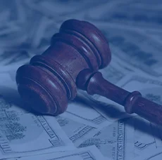 4 Settlement Gavel Sitting On Pile Of Money