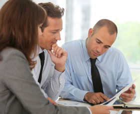Attorney Explaning Car Insurance Claim Details To Clients